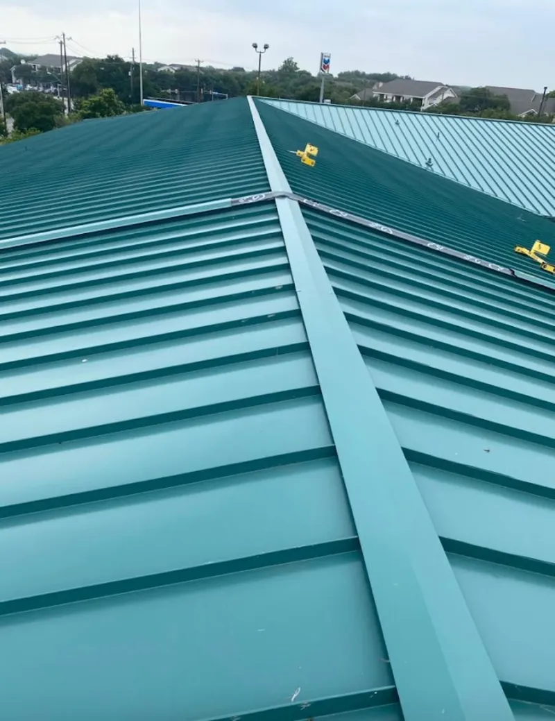 Green commercial metal roof ridge and valley for Metal Roof Repair in Eudora